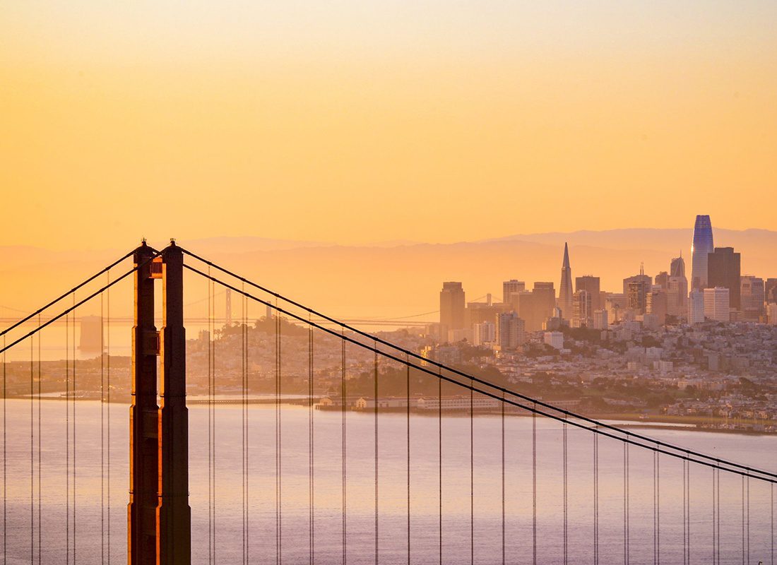 About Our Agency - Aerial View of the Top of the Golden Gate Bridge and San Francisco During Sunrise