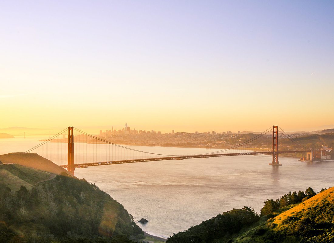 Insurance Solutions - Aerial View of the Gold Gate Bridge at the Bay of San Francisco During Sunrise